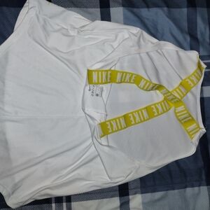 Nike White Top with Yellow Straps. It Is Large In Kids But Fits Small Women.